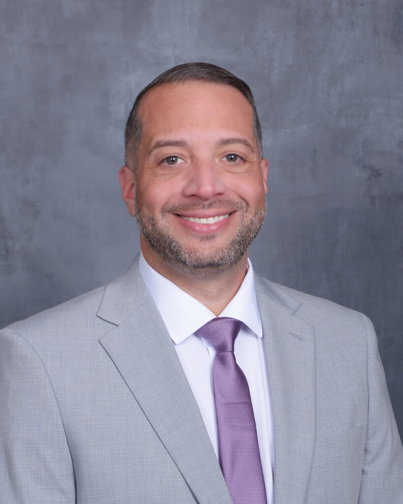 Headshot of Rally Austin Board Member Angel Vales